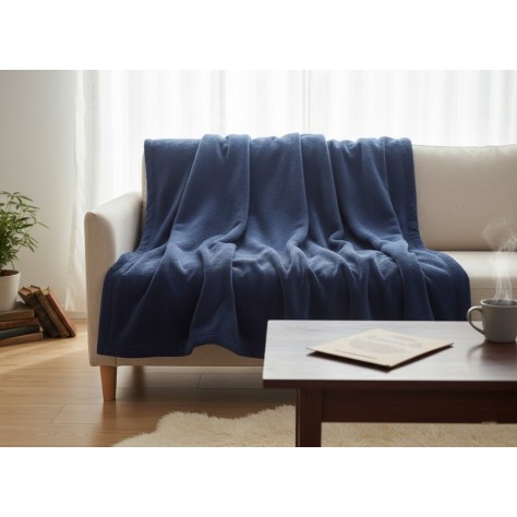 manta de sofa de coralina en azul marino de 130x160 cm.