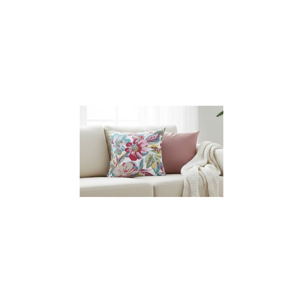 Funda de Cojín Estampado Floral Vibrante (40x40 cm) sobre un sofa