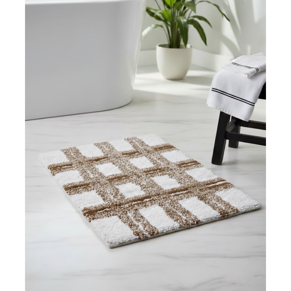 Alfombra de baño de algodón beige y blanco de 40x60 cm sobre suelo de mármol