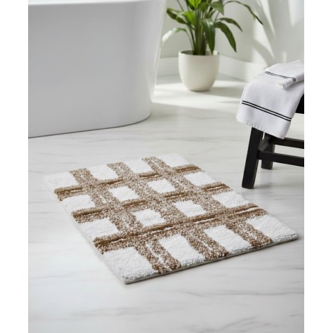 Alfombra de baño de algodón beige y blanco de 40x60 cm sobre suelo de mármol