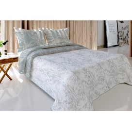 Colcha bouti reversible marca Bianca modelo Dorna con estampado botánico en tonos grises y blancos, acolchado termosellado
